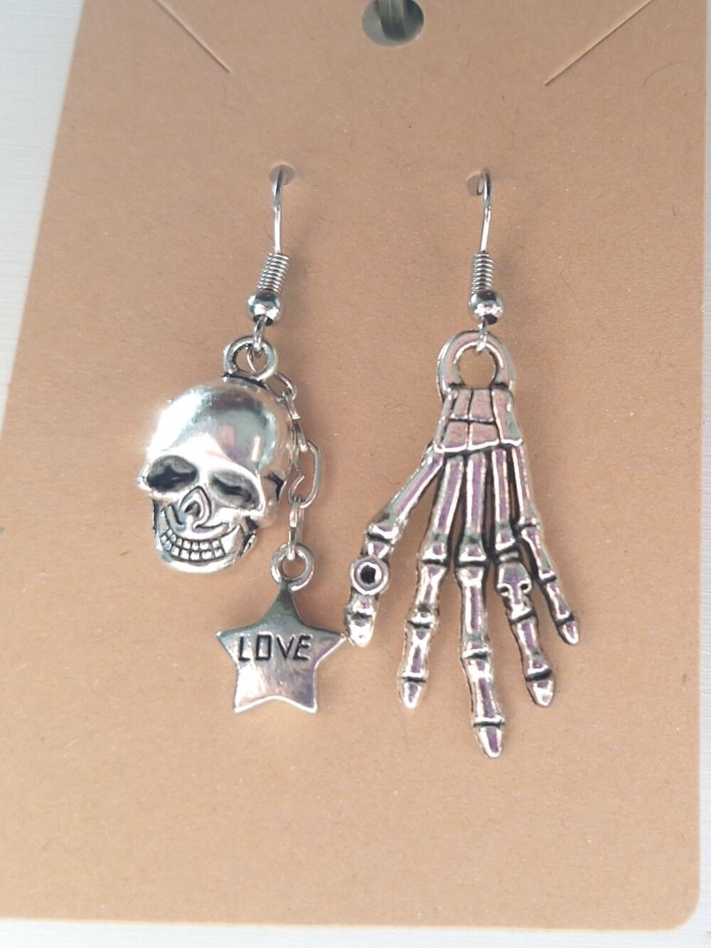 Silver Skull & Skeleton Hand Mismatched Earrings with “LOVE” Star Charm